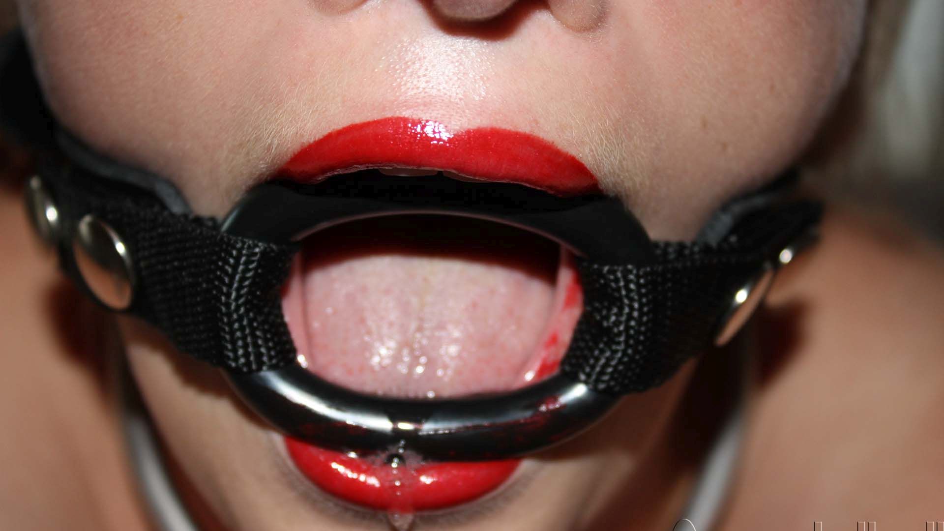 Dribbling with a gag in bondage